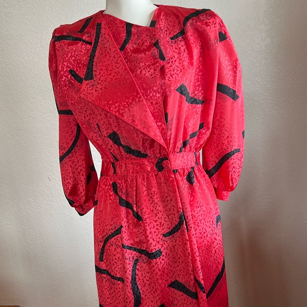 Vintage (80s) polyester dress with fun, flattering v neck.